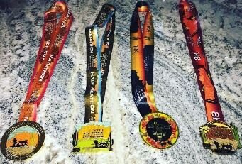 10K finisher medal - 2027 design coming soon