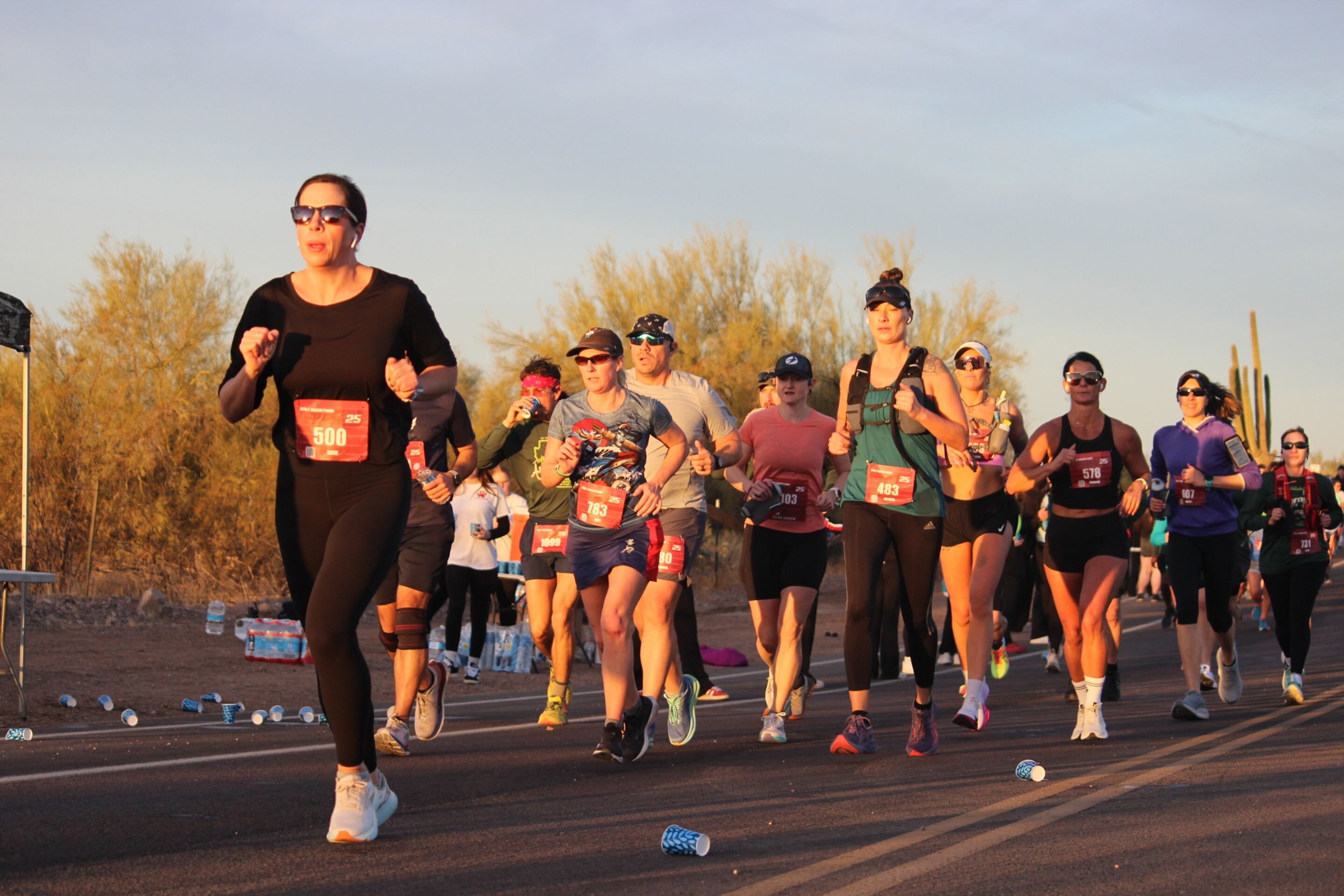 Runners at the Lost Dutchman Marathon finish line